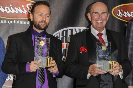Daniel Negreanu and Jack McClelland receiving their Poker Hall of Fame trophies in 2014