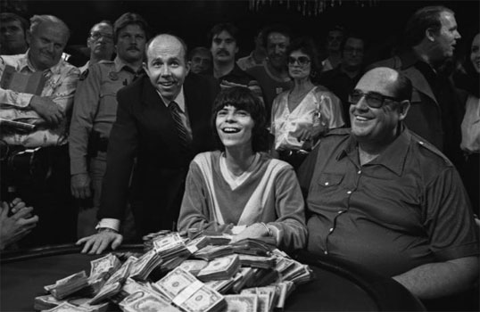 1980 World Series of Poker Champion Stu Ungar (center), Benny Binion (left), and Doyle Brunson (right). Ungar would win again in 1981 and then in 1997. He's still the only 3-time WSOP Main Event winner.